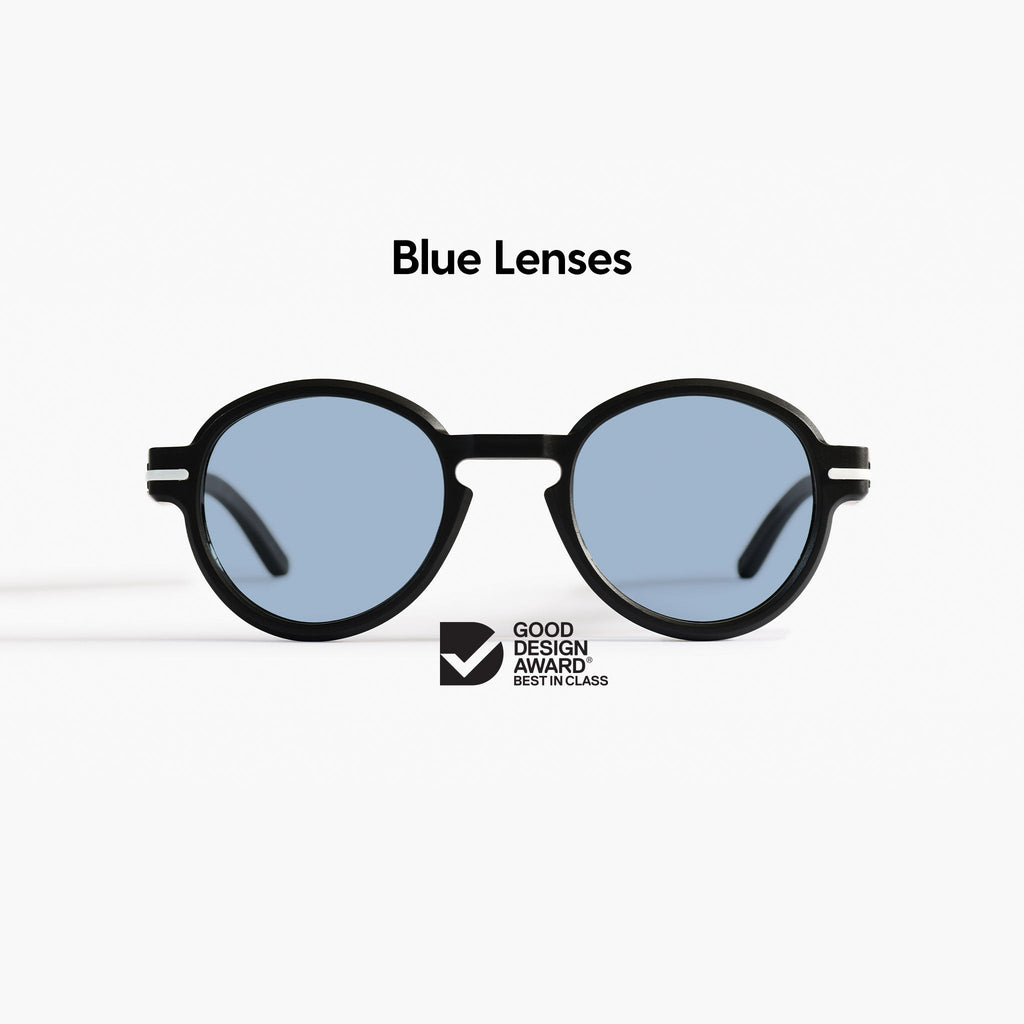 Good Citizens round black sunglasses on a white background with blue Carl Zeiss lenses and 100% recycled plastic frame