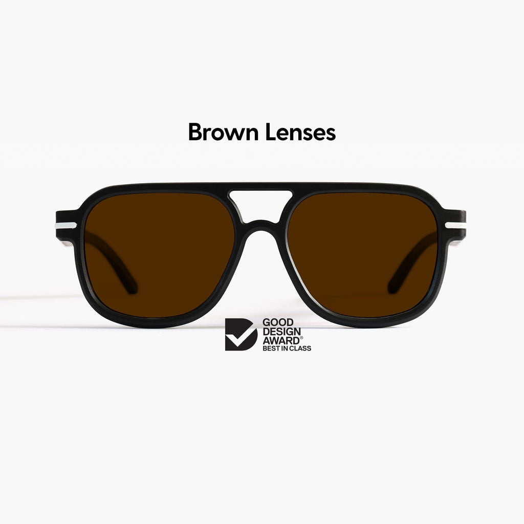 Good Citizens aviator black sunglasses made in Australia on a white background, showcasing brown Carl Zeiss lenses and 100% recycled plastic frame