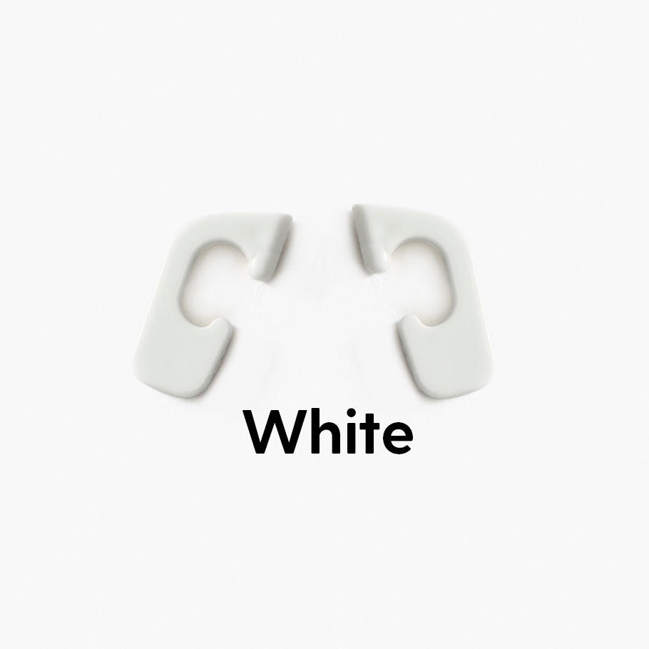 White interchangeable clips for Good Citizens' 100% recycled frames, adding vibrant, customisable style